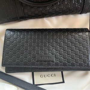 Gucci Black Logo Embossed Wallet